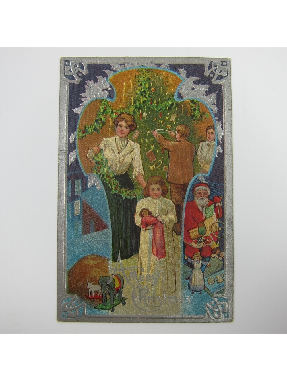 Christmas Postcard Santa Toys Mother Children Dress Tree Silver Embossed Antique